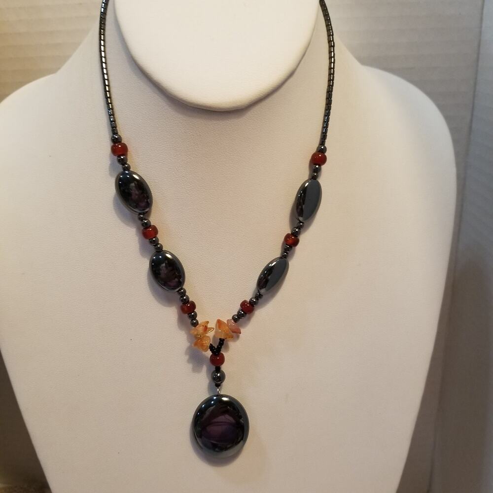 Hematite and carnelian necklace 16 inches with two inch drop pendant